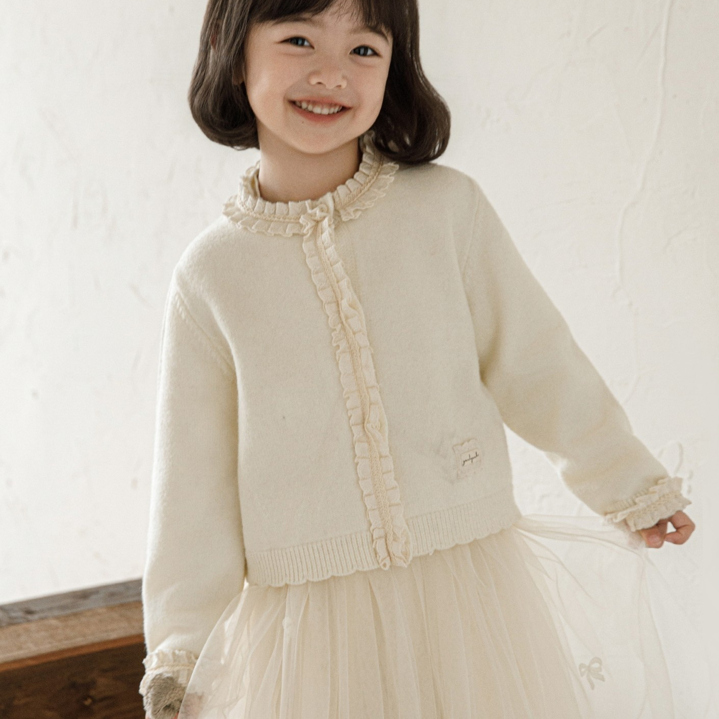 Knitted Cardigan With A Lace Collar And Ruffled Hem And Cuffs Sweater