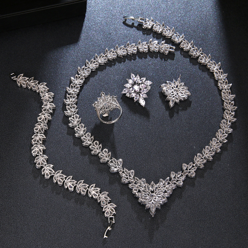The Dazzling Set Is Handcrafted With Copper And Set With Zircon Stones
