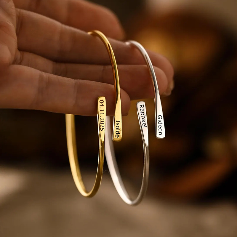 The Stainless Steel Adjustable Bracelet Features A Flat Braided Open-end Design At Both…