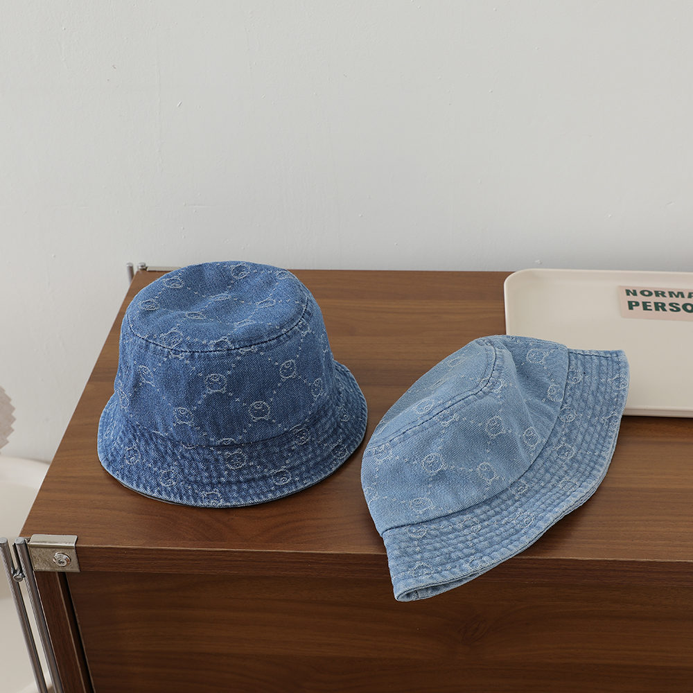 Retro Washed Baby Denim Fisherman Hat With Full Pattern Of Diamond-shaped Jacquard And A Small Bear On The Brim photo 2