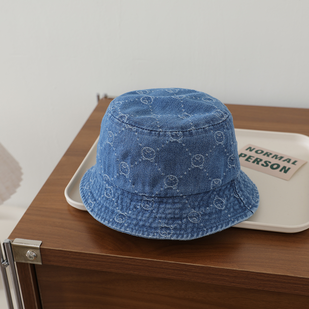 Retro Washed Baby Denim Fisherman Hat With Full Pattern Of Diamond-shaped Jacquard And A Small Bear On The Brim photo 3