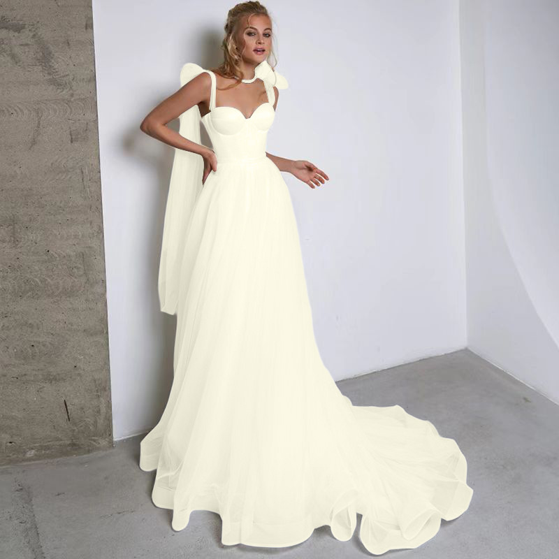 French-style Strapless Wedding Dress With A Bow Featuring A Tulle Train photo 3
