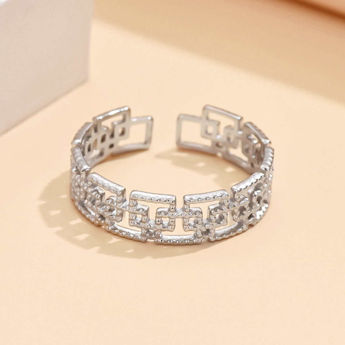 Traditional Chinese Style Openwork Spiral-pattern Stainless Steel Ring photo 4