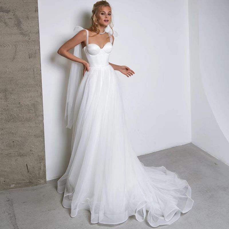 French-style Strapless Wedding Dress With A Bow Featuring A Tulle Train photo 7