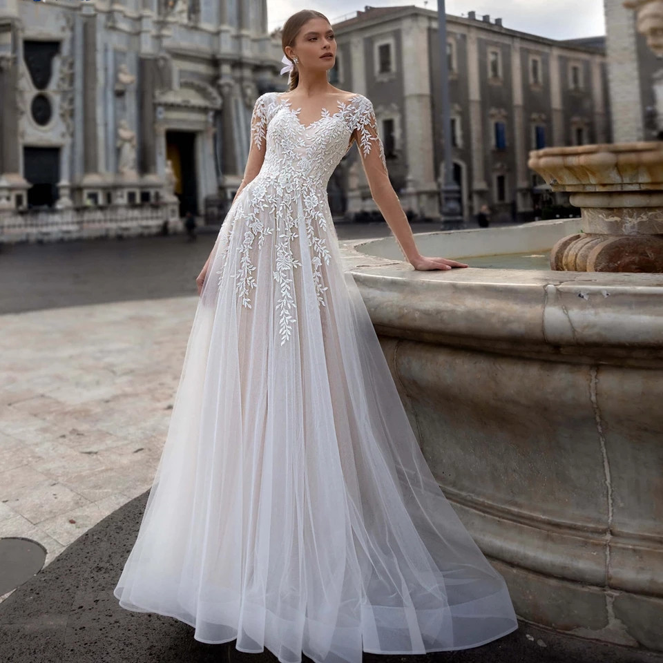 Lace Sheer Tulle A line Wedding Gown With A Short Train, Exuding Elegance For The Bride photo 1