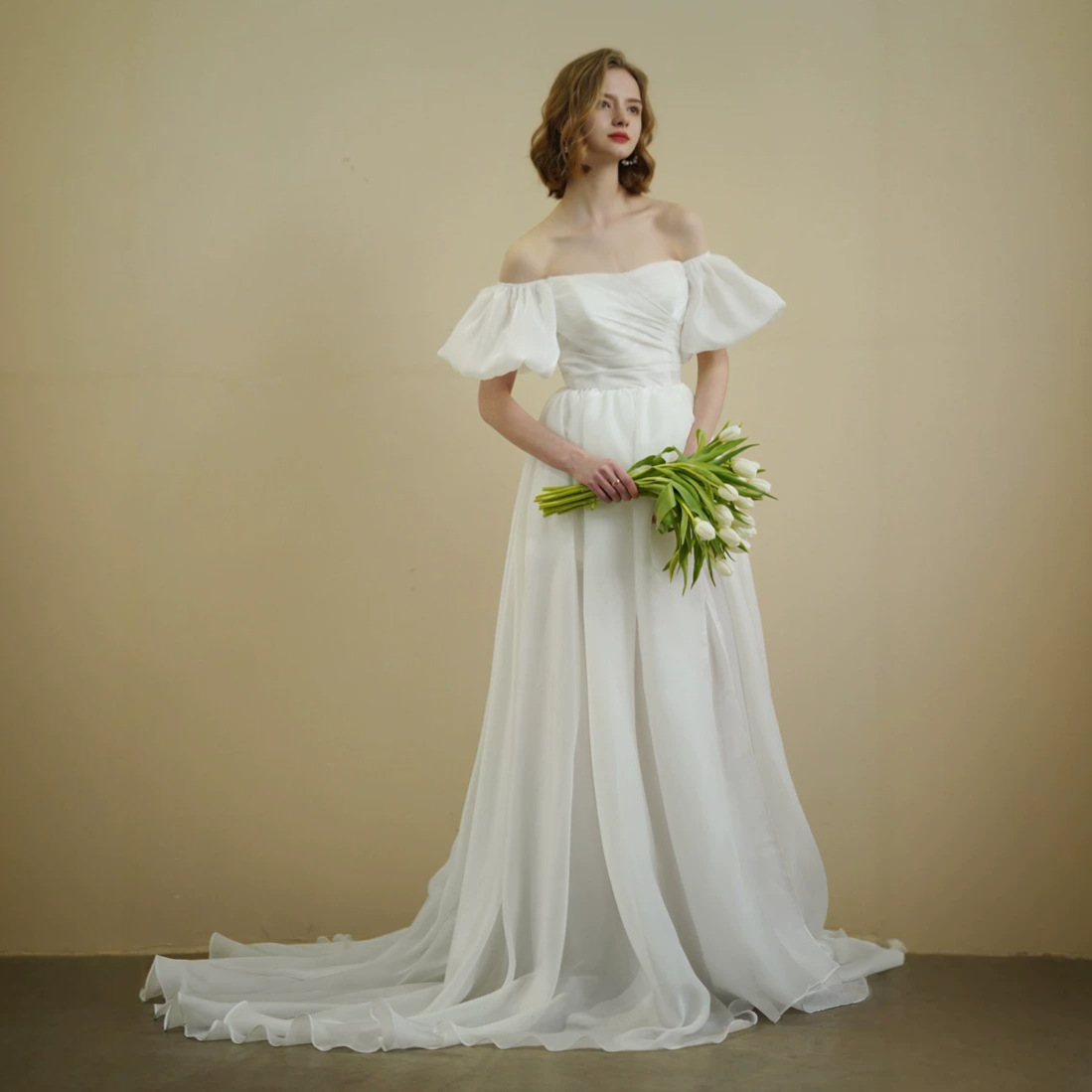 Off-the-shoulder Lightweight Wedding Dress With A Minimalist Chiffon Design And An Elegant Long Train photo 2