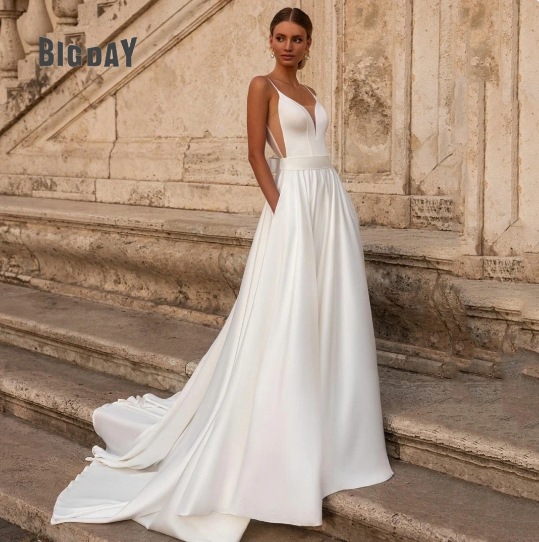 Simple Deep-V Strap Satin Wedding Dress photo 1