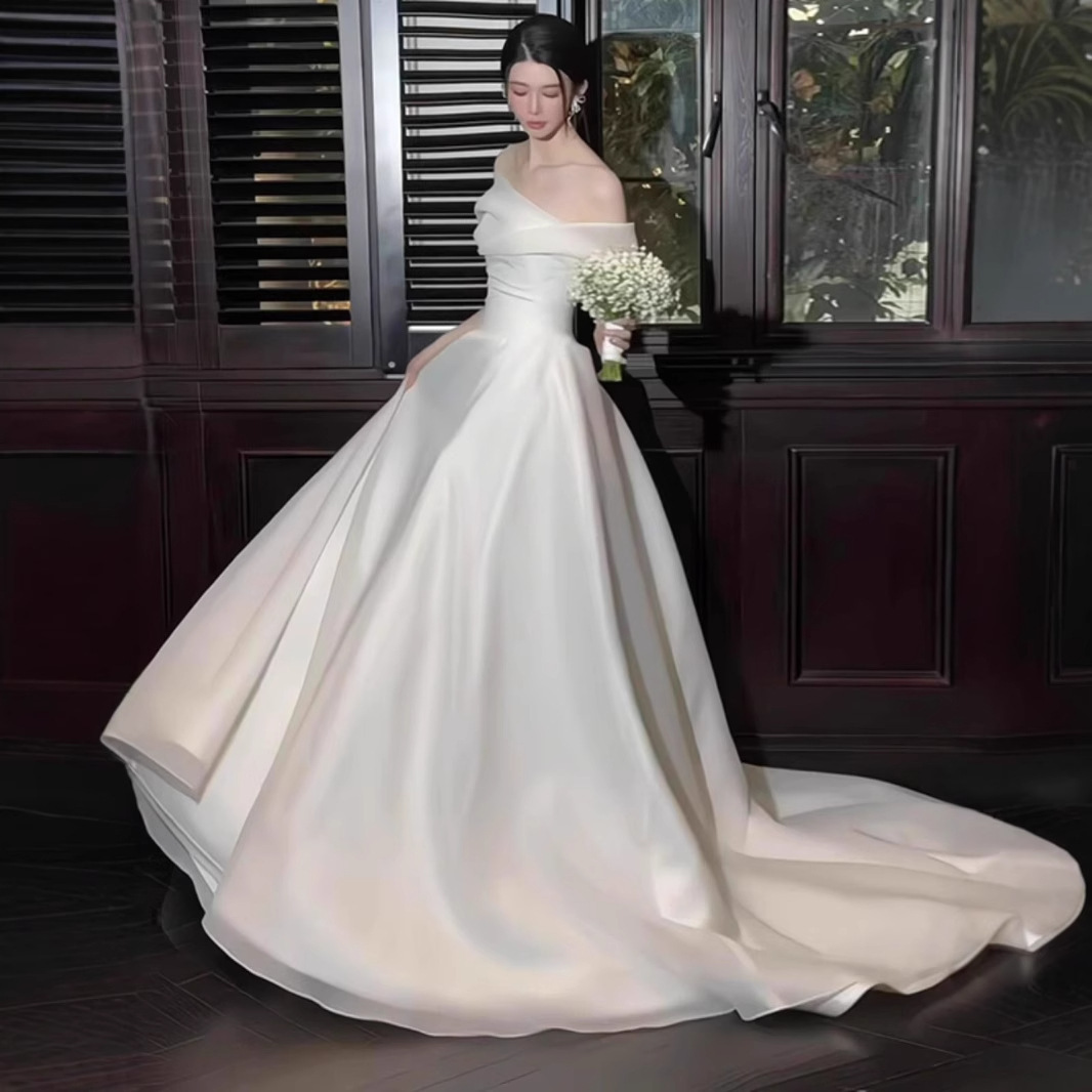 Elegant Satin Off-shoulder Light Wedding Dress Simple And Sophisticated photo 3
