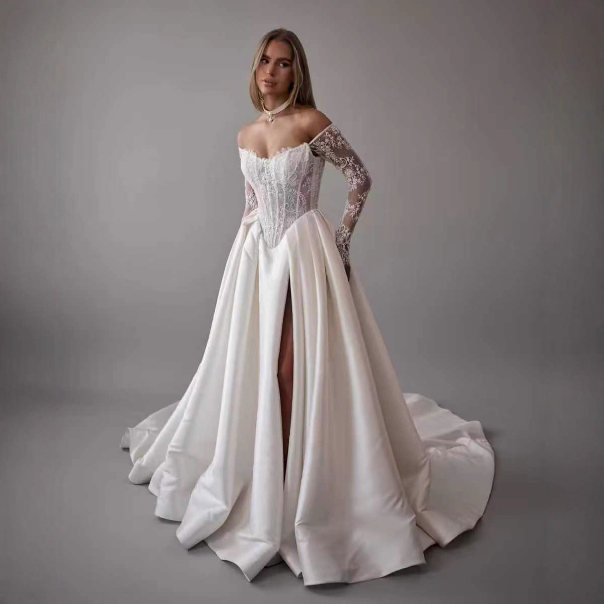 One-shoulder Lace Long-sleeve Wedding Dress photo 3