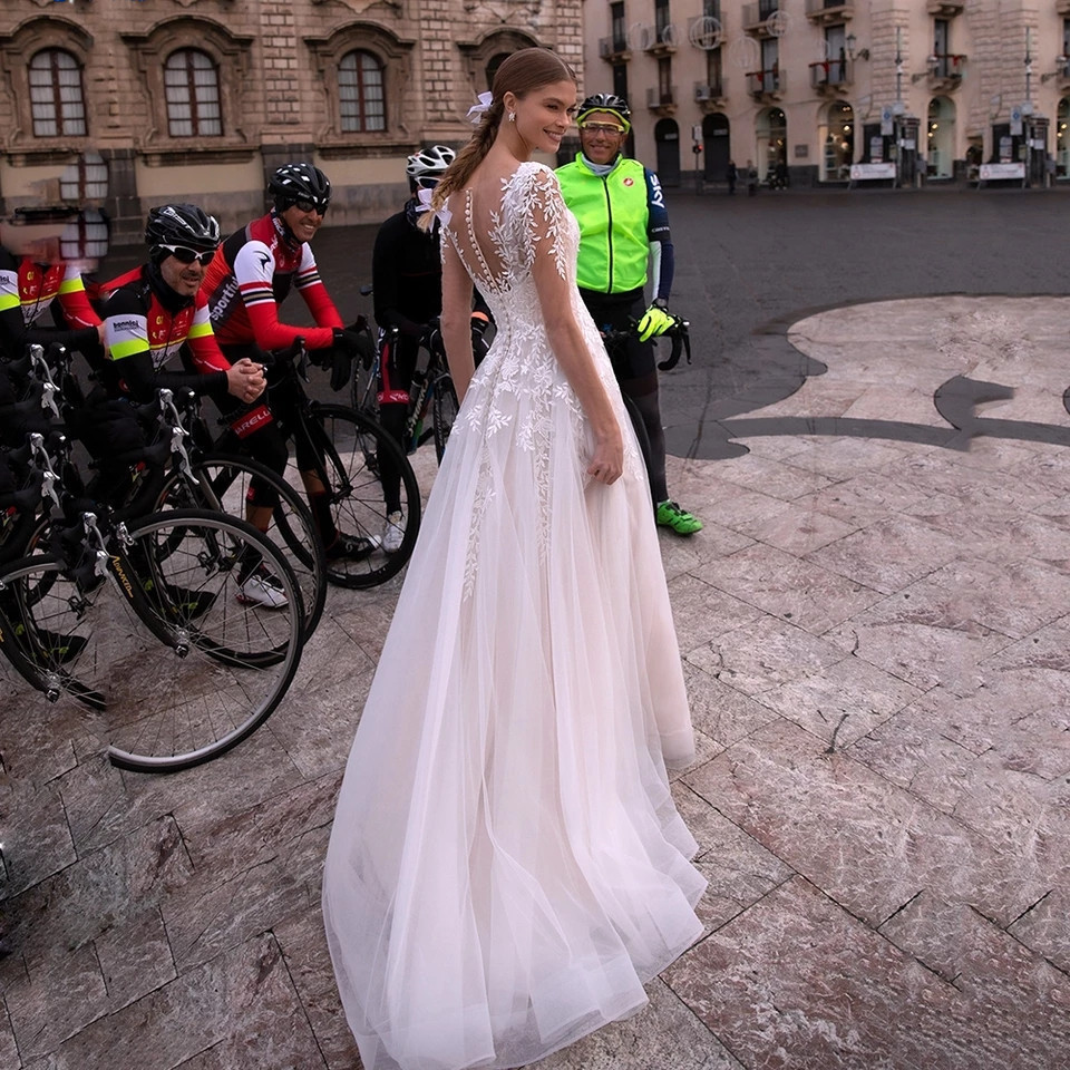 Lace Sheer Tulle A line Wedding Gown With A Short Train, Exuding Elegance For The Bride photo 2