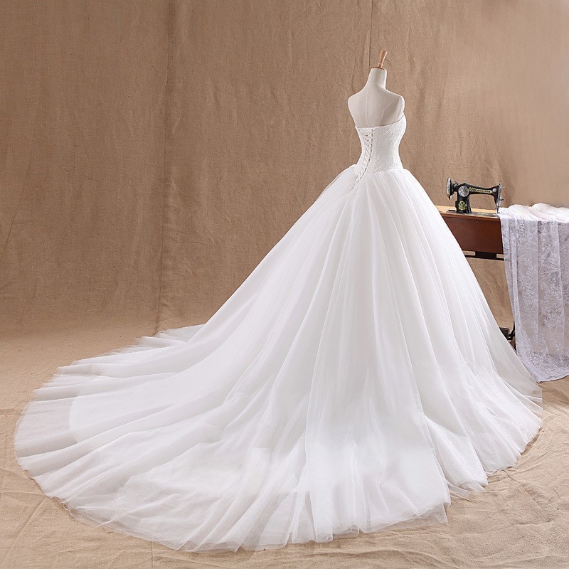 Simple And Elegant Strapless Lace Wedding Dress photo 6