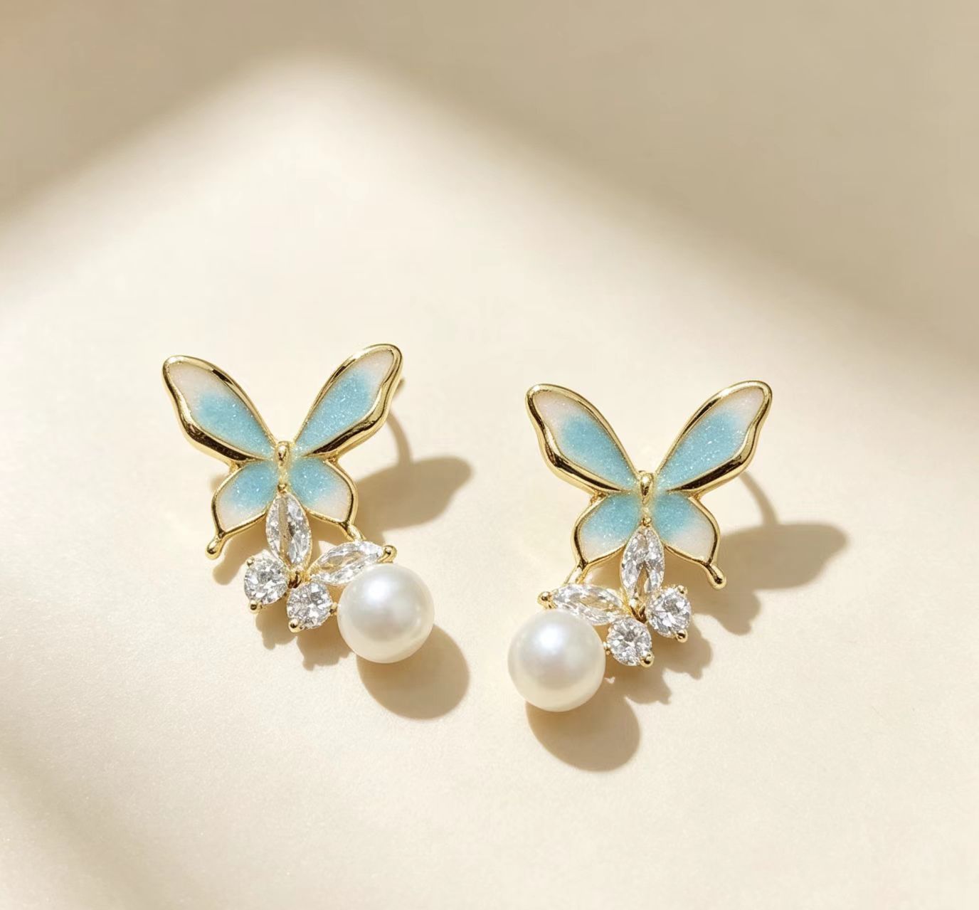 Dripping-oil Pearl Butterfly Elegant High-end Silver Needle Earrings photo 6