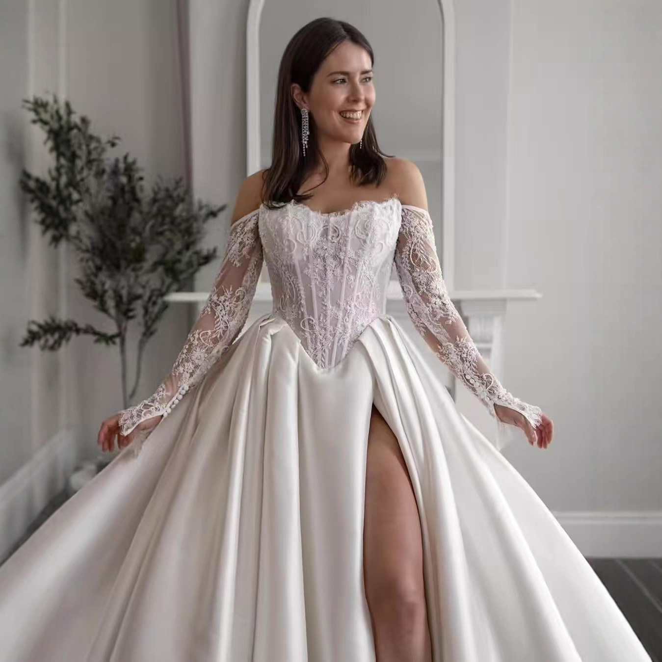 One-shoulder Lace Long-sleeve Wedding Dress photo 4