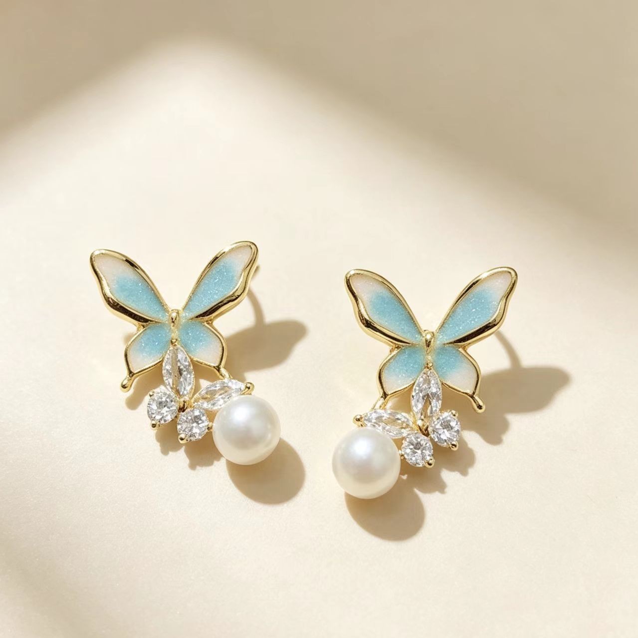 Dripping-oil Pearl Butterfly Elegant High-end Silver Needle Earrings photo 4