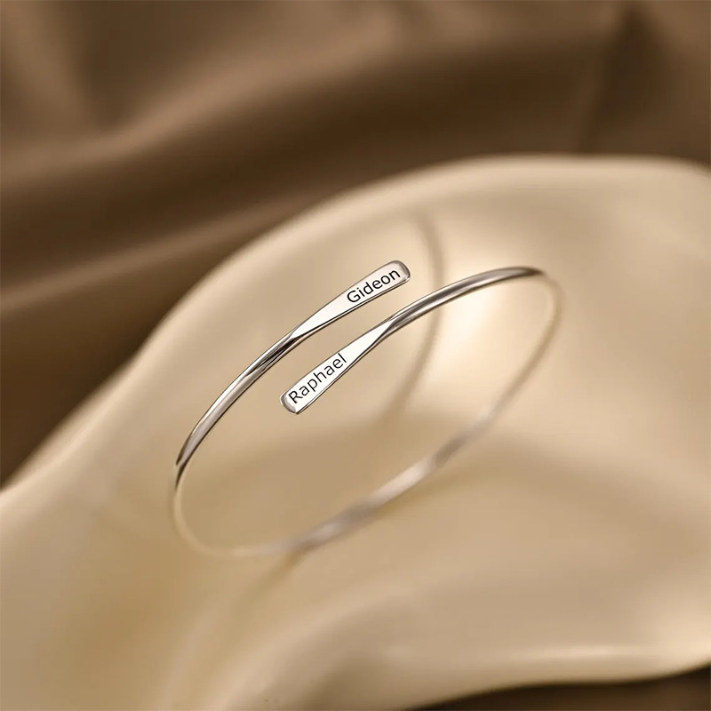 The Stainless Steel Adjustable Bracelet Features A Flat Braided Open-end Design At Both Ends photo 6