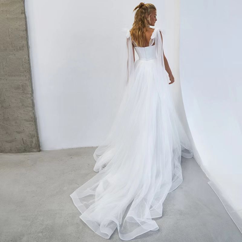 French-style Strapless Wedding Dress With A Bow Featuring A Tulle Train photo 5