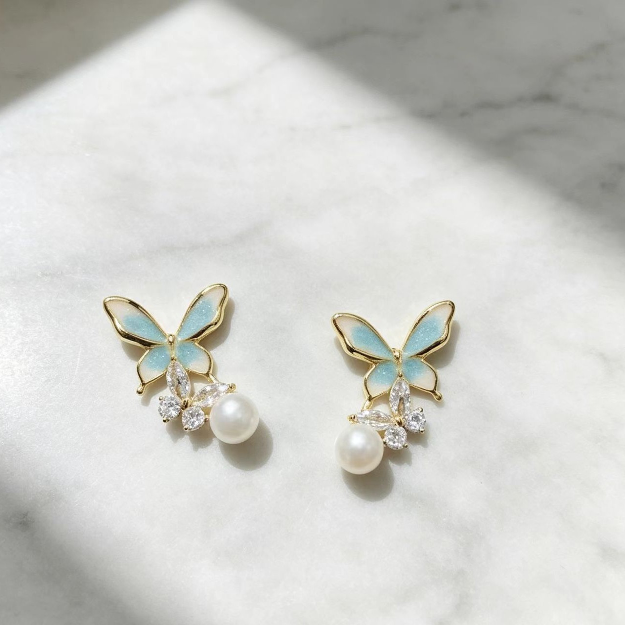 Dripping-oil Pearl Butterfly Elegant High-end Silver Needle Earrings photo 3