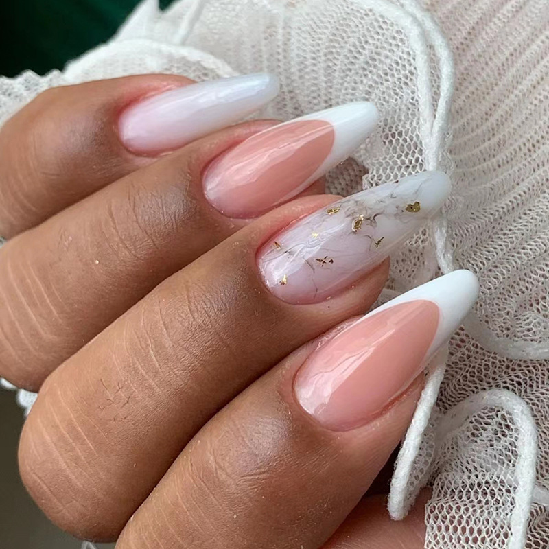 Almond-shaped White French Manicure With Messy Line Art On The Tips photo 1