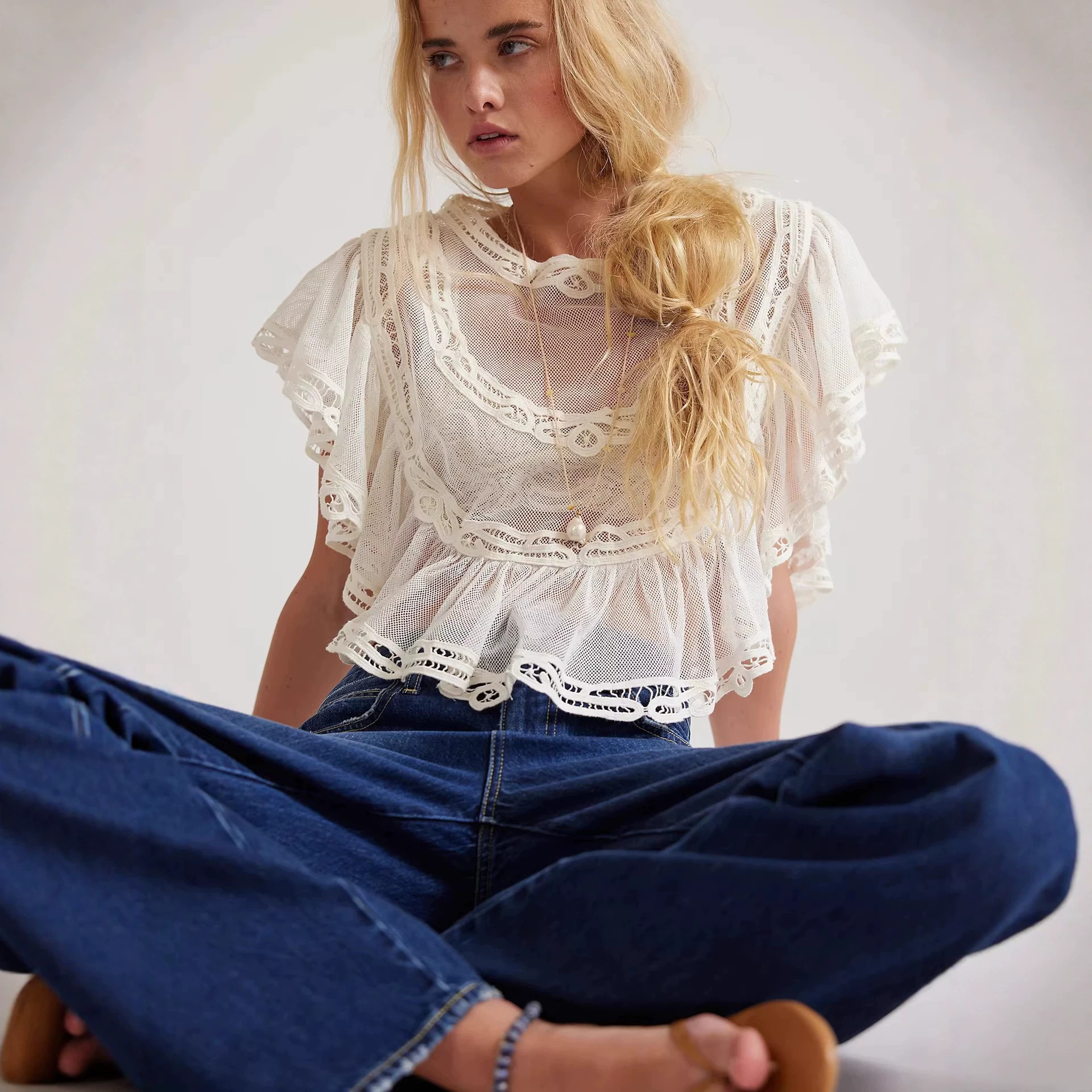 Long-sleeve Knitted Hollow-out Top With Tie-up Details photo 1
