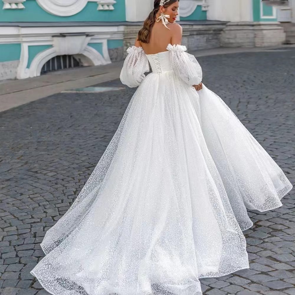 Off-shoulder Lightweight Wedding Dress That Flatters The  With A Trailing Train photo 4