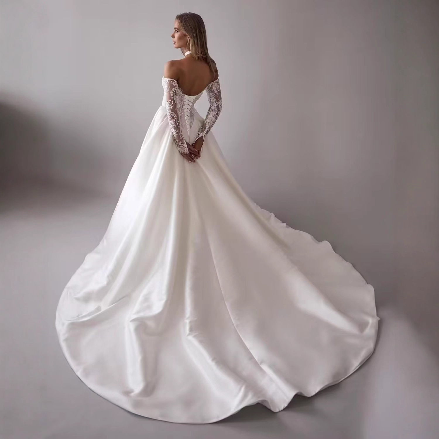 One-shoulder Lace Long-sleeve Wedding Dress photo 5