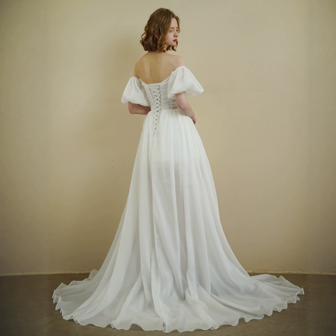 Off-the-shoulder Lightweight Wedding Dress With A Minimalist Chiffon Design And An Elegant Long Train photo 3