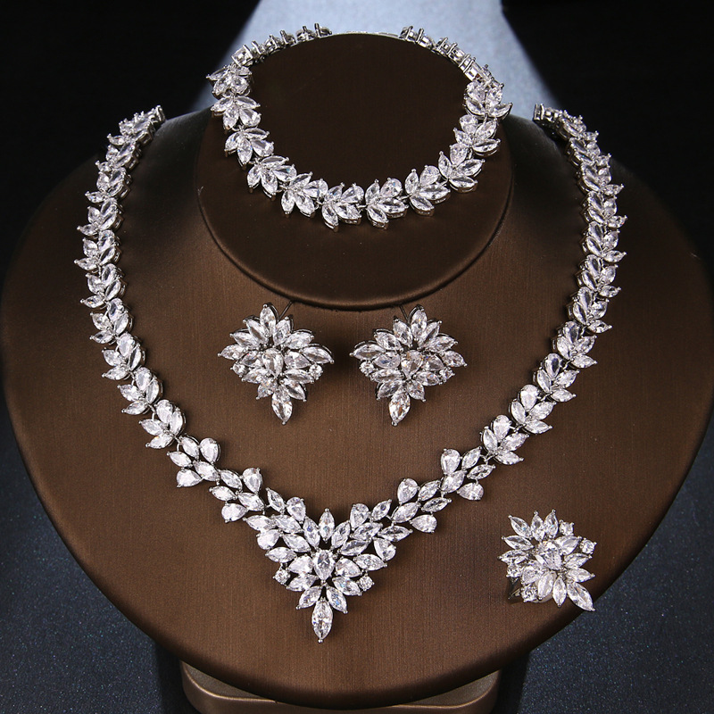 The Dazzling Set Is Handcrafted With Copper And Set With Zircon Stones. photo 3